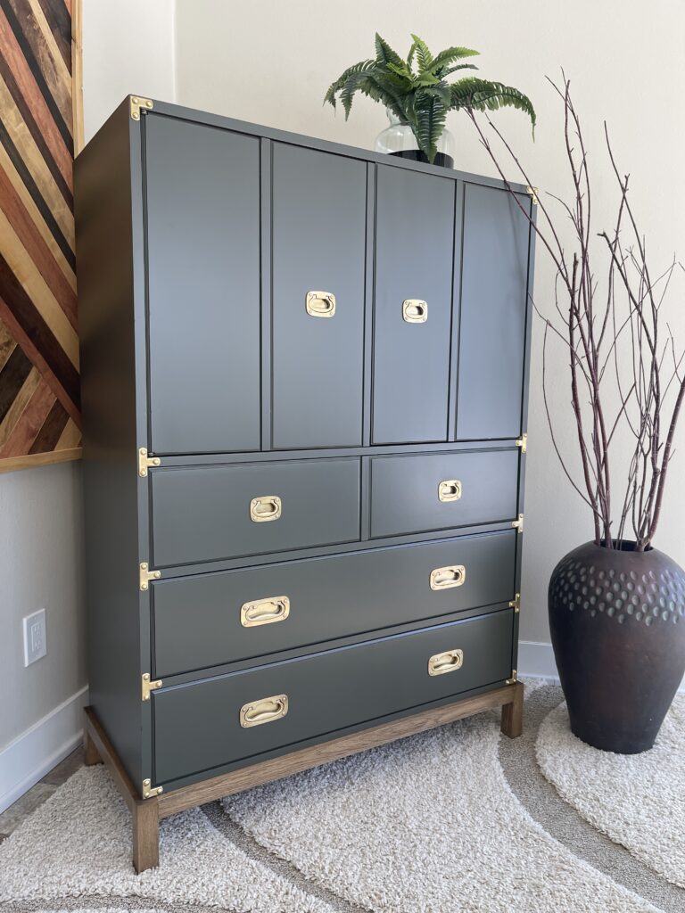 Drexel campaign style armoire painted green with wood base